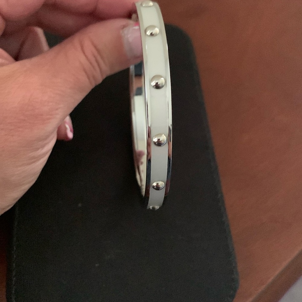Coach silver and white enamel color bangle bracelet. Never worn like new